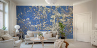 White Blossoms Against a Clear Blue Sky spring photography wall mural in a bright Scandinavian living room with cream sofa and armchairs