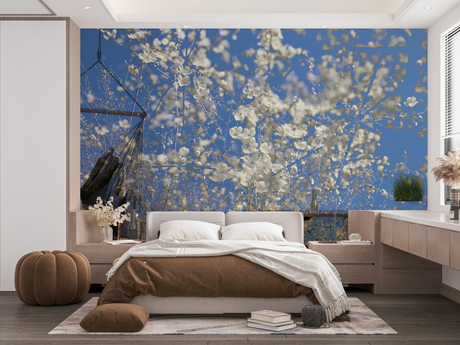 White Blossoms Against a Clear Blue Sky spring photography wall mural behind a brown bed with wood nightstands in a bedroom
