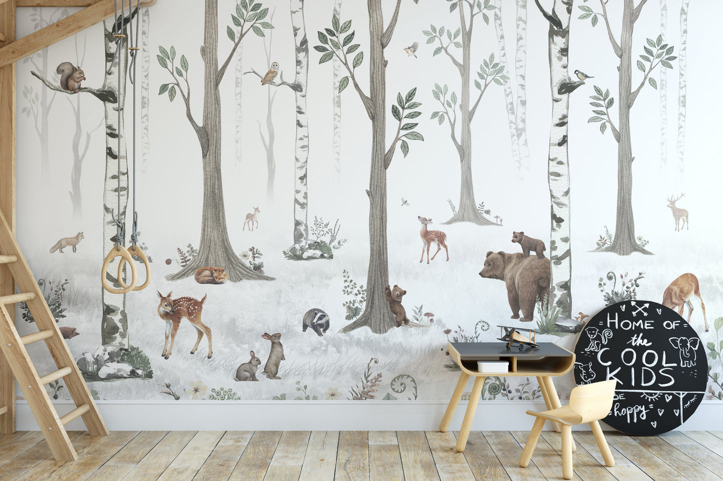 White Forest wallpaper of birch trees, deer and bears beside a loft bed ladder in a kids room