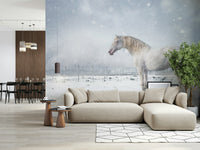 Snowdrift Horse wallpaper mural with a white horse in falling snow above a white dresser in a child's nursery