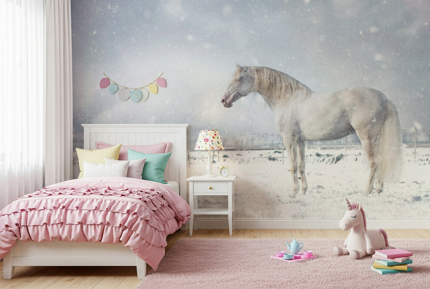 Snowdrift Horse wallpaper mural of a white horse in snow above a white dresser and teddy bear basket in a kids room