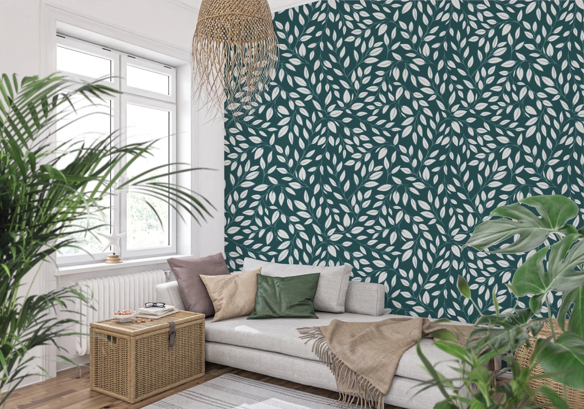 White Vines on Teal wallpaper behind a white daybed with leafy palms under a woven rattan pendant