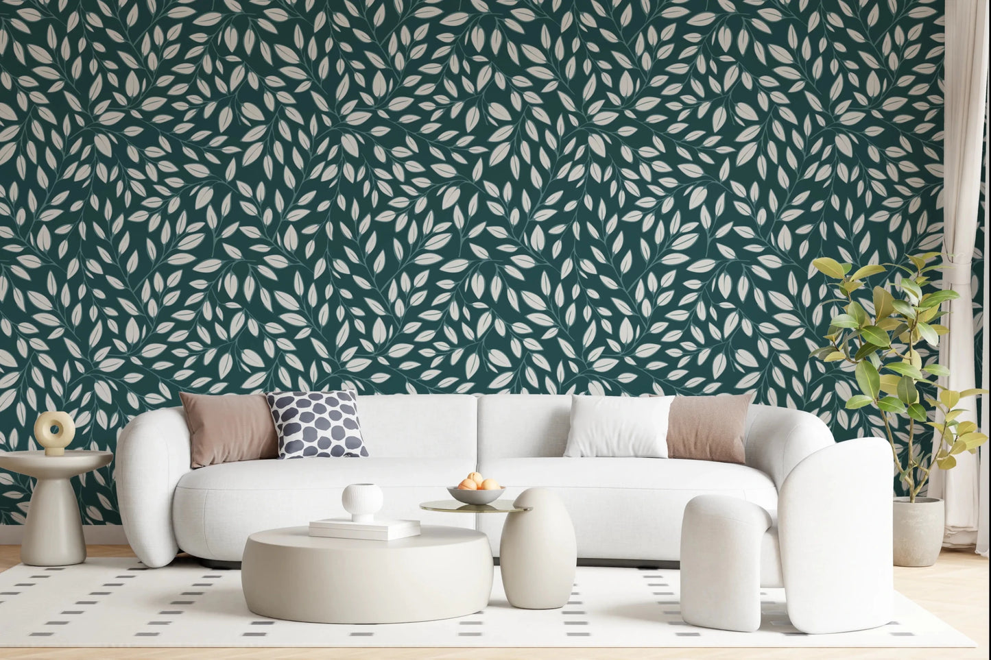 White Vines on Teal wallpaper behind a white curved sofa and round ottomans in a soft modern living room