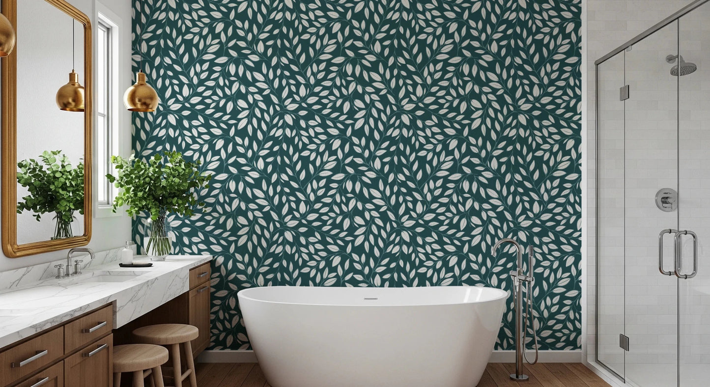 White Vines on Teal wallpaper behind a freestanding tub and marble vanity with gold pendants in a bathroom
