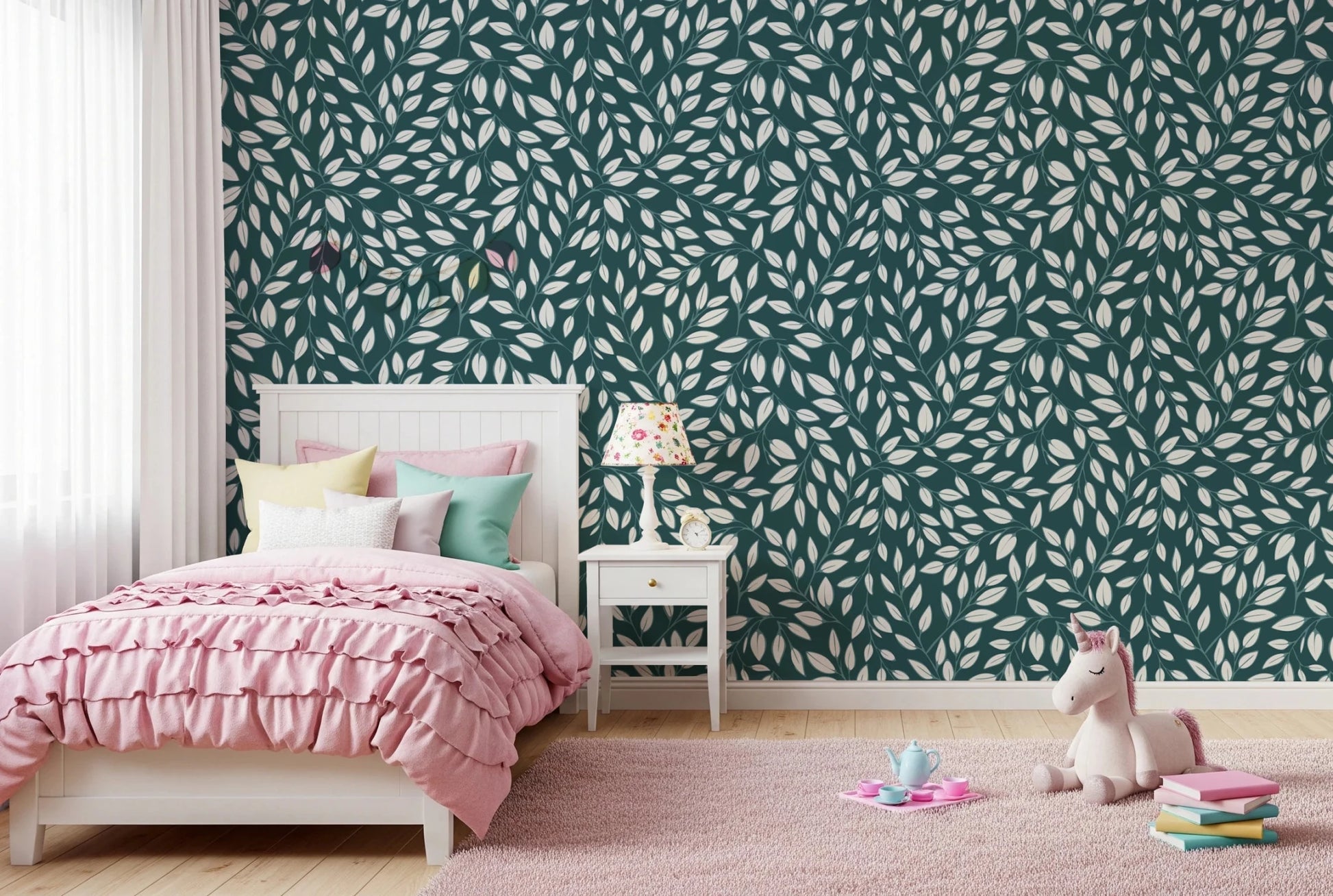 White Vines on Teal wallpaper in a girls bedroom with a white bed, pink ruffle bedding and a unicorn toy