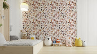 Natural wallpaper with delicate wildflowers in muted tones.

