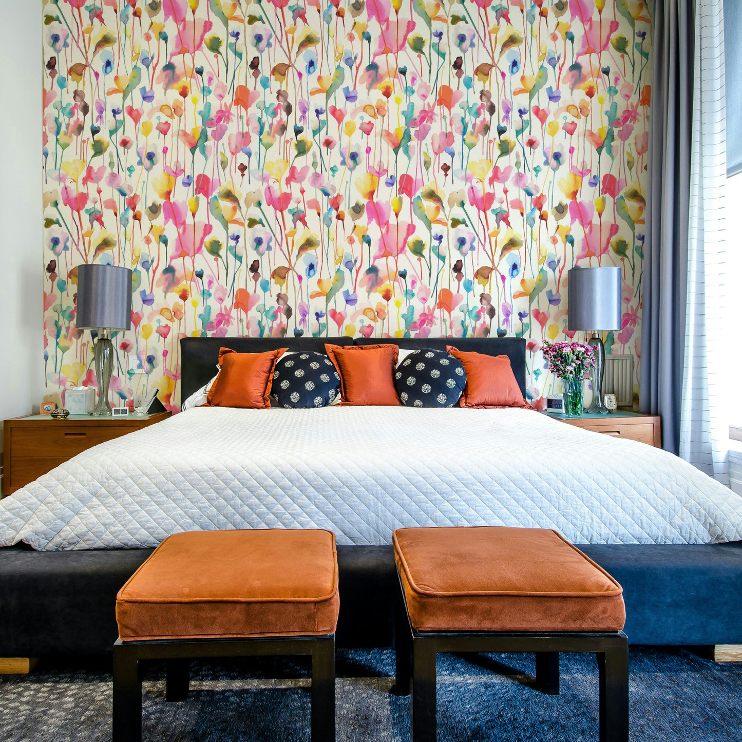 Wild Flowers Watercolor Pink Wallpaper used in a child’s room with natural wood textures.