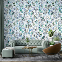 Nature inspired blue wallpaper for a guest room with neutral colour tones.