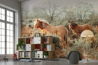 Mural of galloping horses in natural setting

