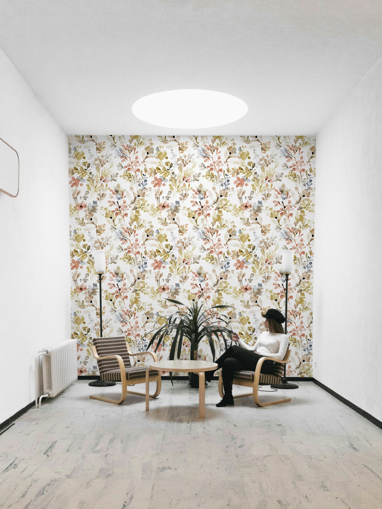 Wild Nature Plants Gold Wallpaper in a library with dark leather seating.