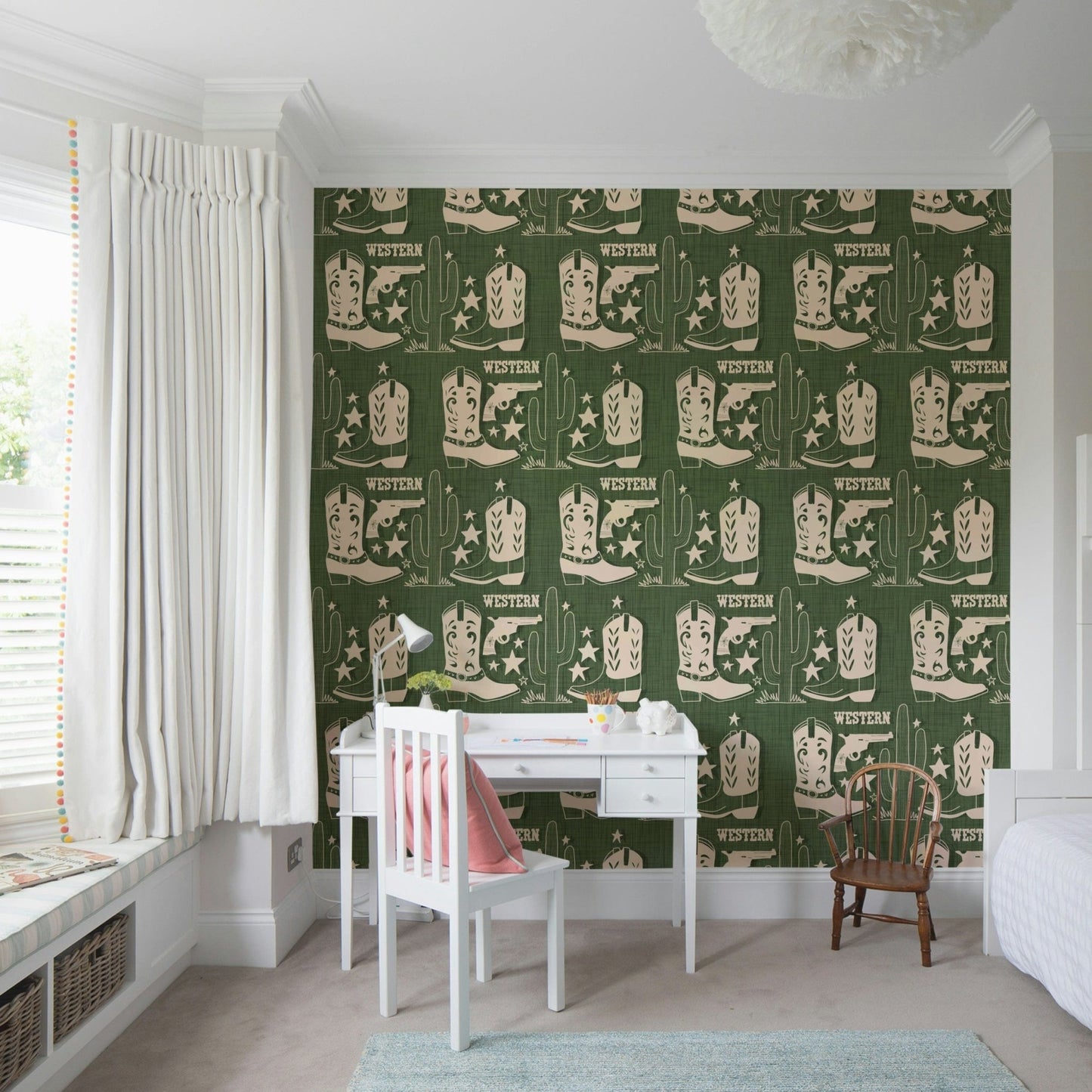 Desert-inspired Western wallpaper featuring bold cream icons on a textured green backdrop.