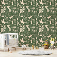 Wild West wallpaper featuring illustrated cowboy scenes, stars, cattle skulls, and desert plants.