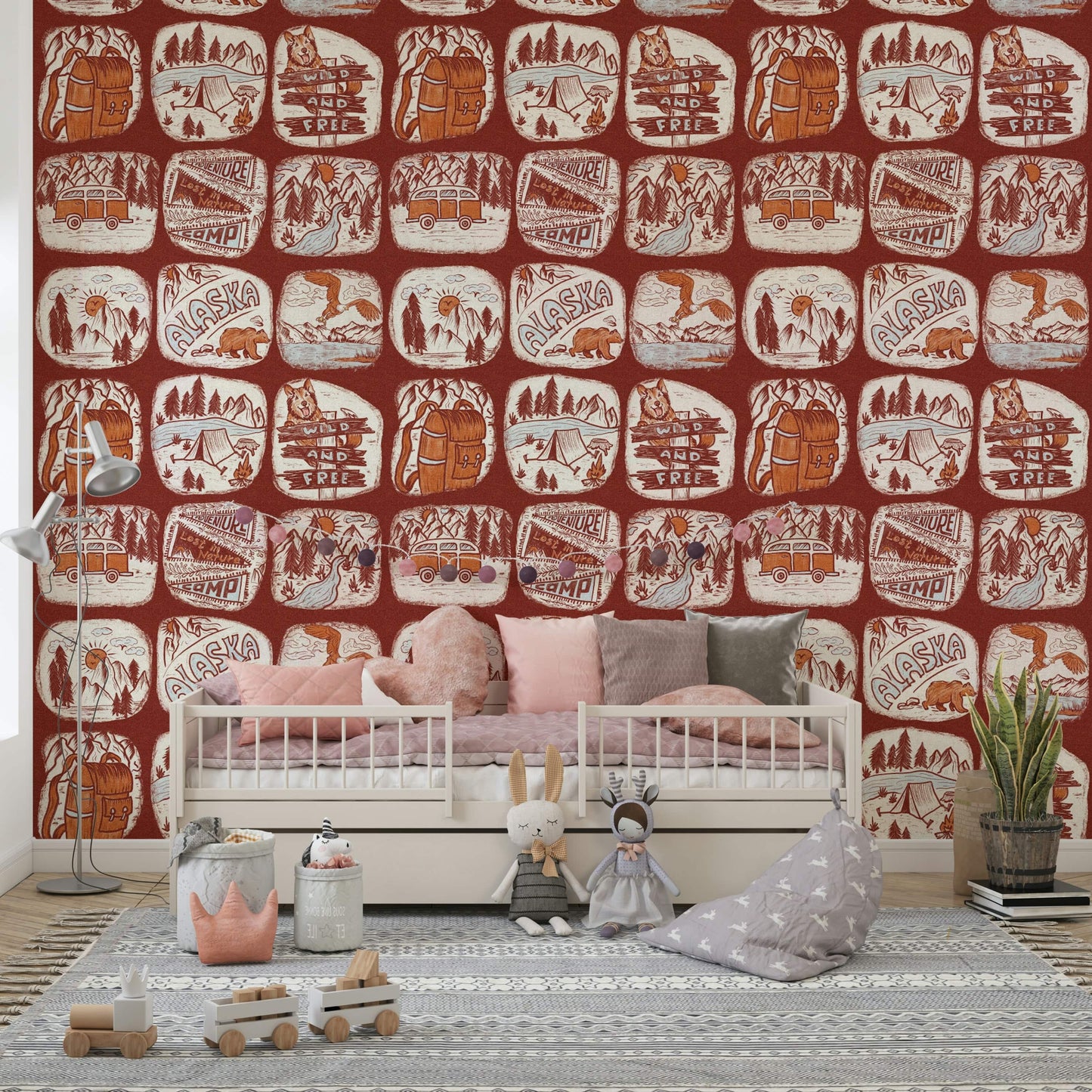 Retro wilderness wallpaper mural with drawn badges of forests, rivers, and mountain peaks.