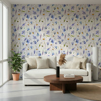 Delicate blue white flowers on a wall