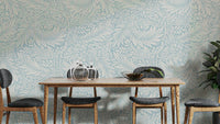 A wallpaper featuring a classic, intricate floral pattern.

