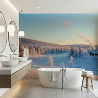 Snowy landscape cabin wall mural for living room, light sky and pine silhouettes