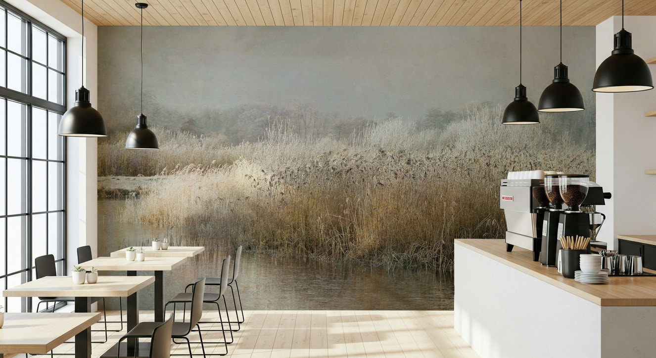 A beautiful frosty riverbank wallpaper mural with winter trees.