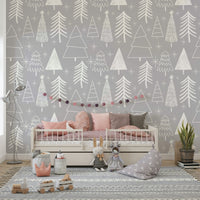 White doodle-style winter trees scattered across a soft gray wallpaper for a subtle festive feel.