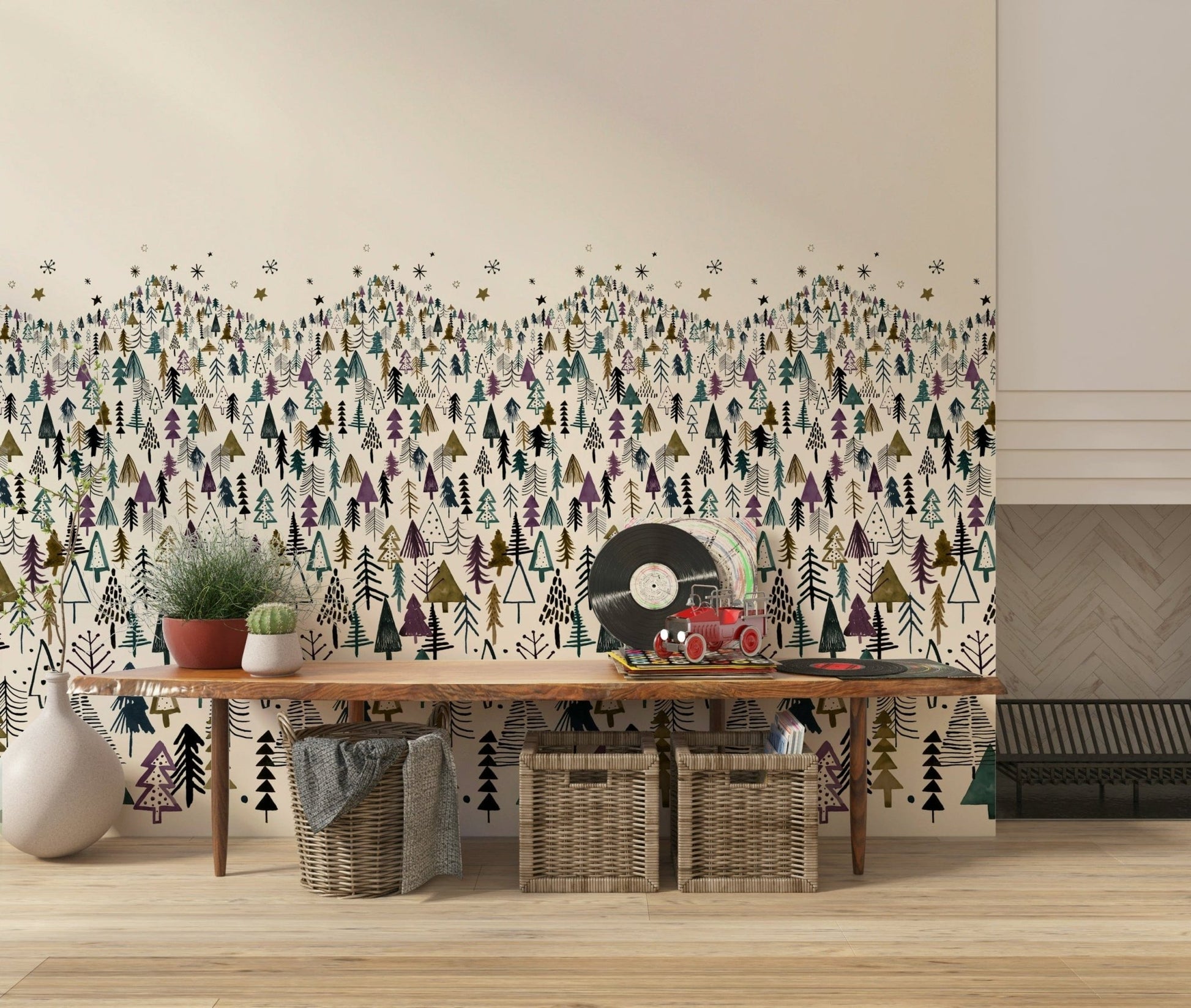 Winter Tree Wonderland wallpaper mural of stylized pines above a wooden console with baskets and vinyl