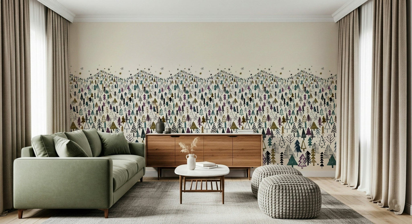 Winter Tree Wonderland wallpaper mural of pine forest behind a sage green sofa and wooden sideboard