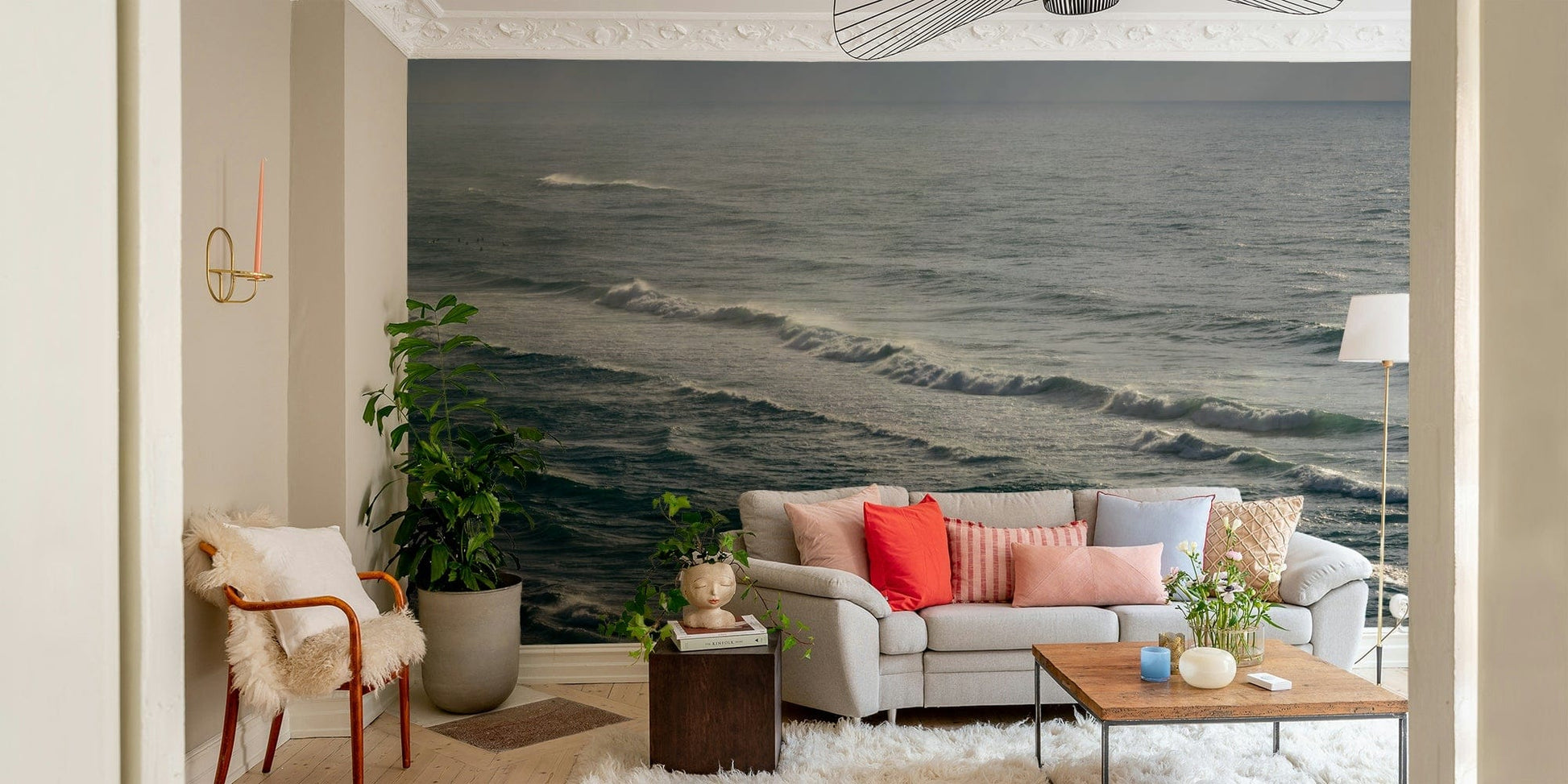 A bedroom with the winter surfing mural behind the headboard.

