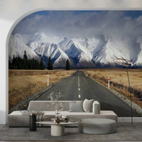 Winter road wall mural in modern living room, snowy trees, cool color tones, feature wall decor