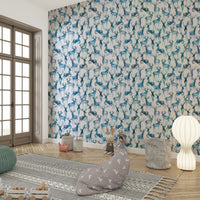 Cool blue nature inspired mural with artistic deer illustrations in a home office.