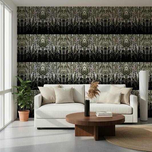 Wisteria Cascade wallpaper in sage and black behind a cream curved sofa in a bright living room