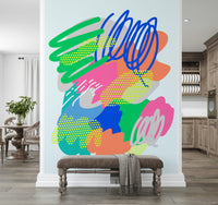 A lively graffiti-style wallpaper filled with colorful strokes, scribbles, and textured dots.