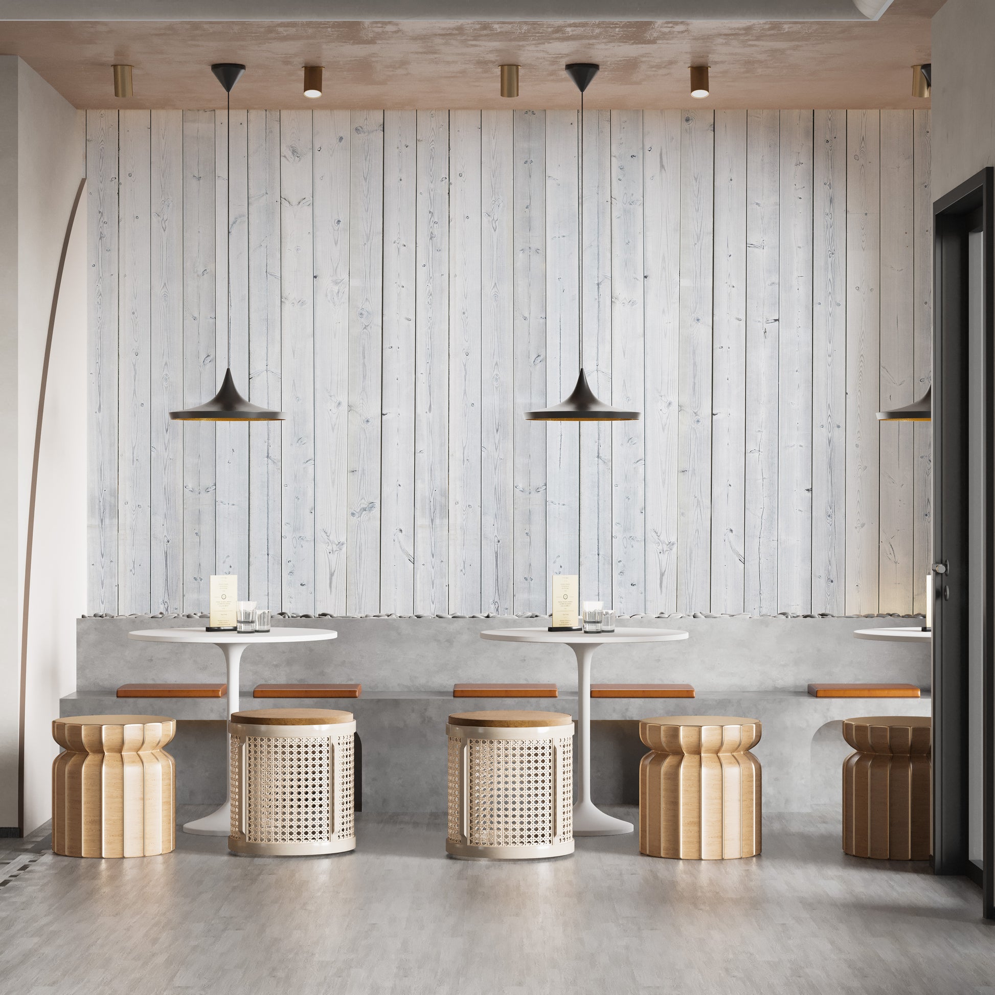 Wood Texture wallpaper in whitewashed planks behind round white tables and rattan stools in a cafe