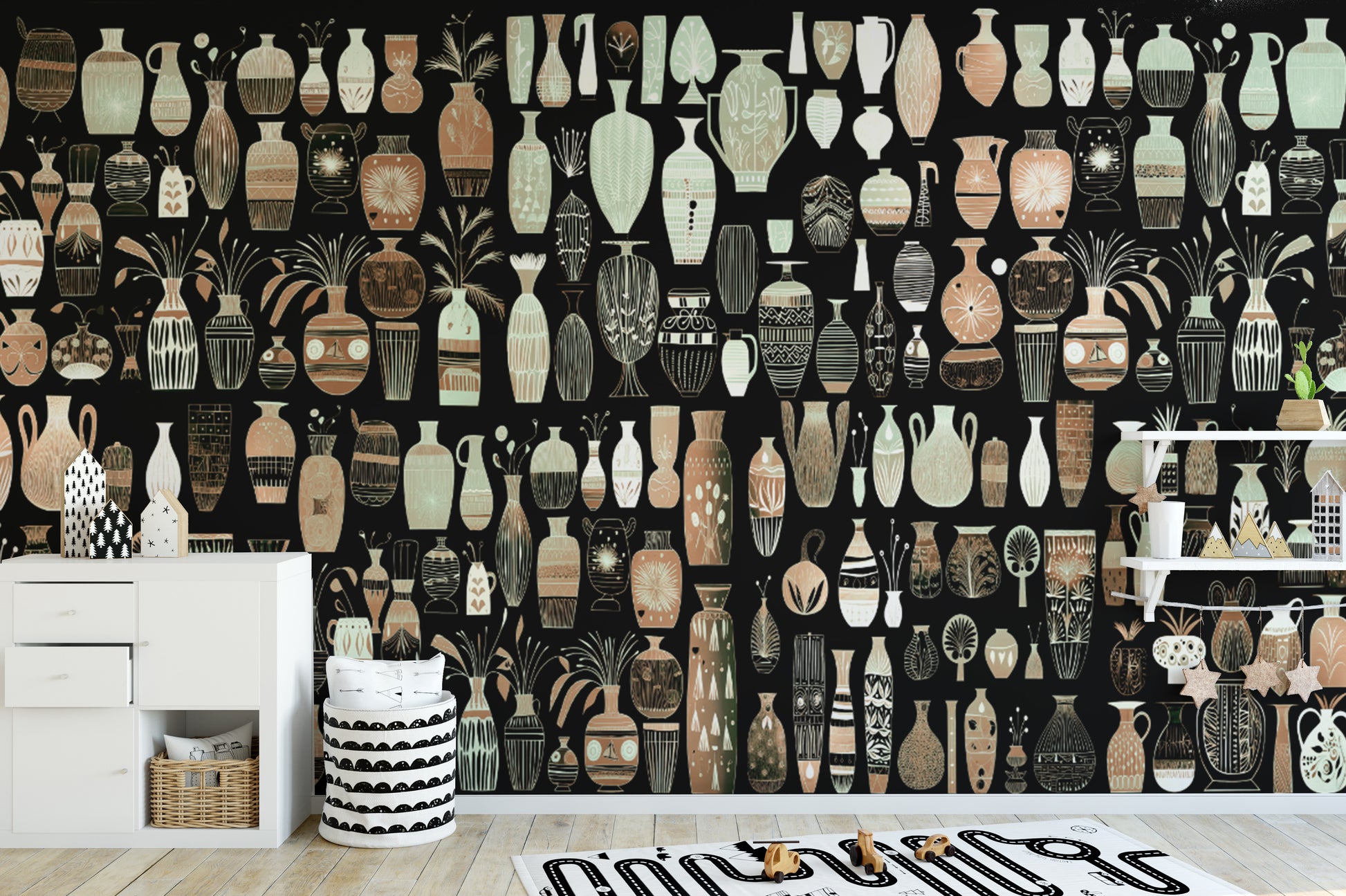 Woodcut Vase Design wallpaper mural of patterned vases on black behind a white sideboard in a kids room