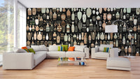 Woodcut Vase Design wallpaper mural of beige and black pottery behind a white sectional sofa in a living room