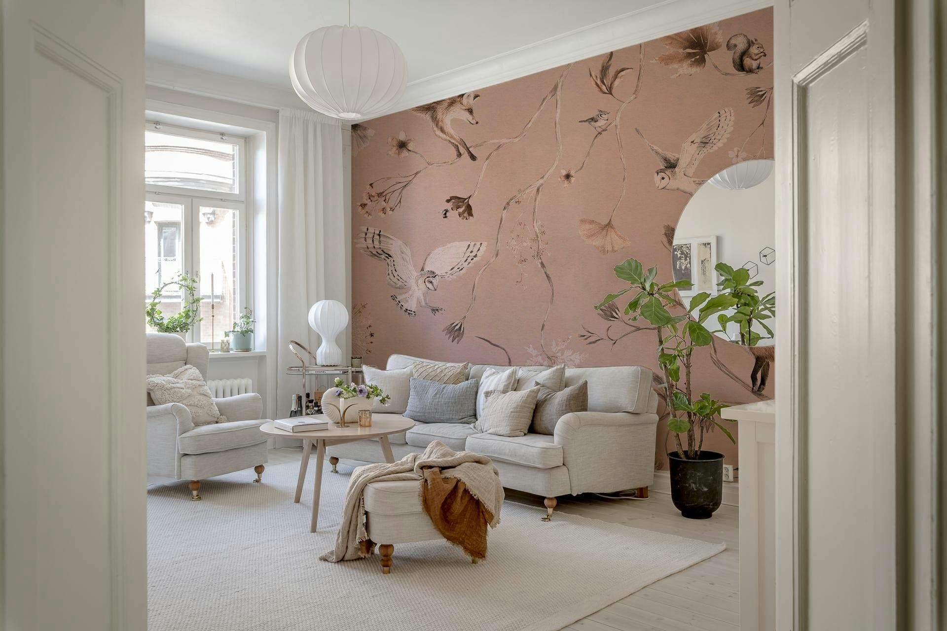 Decorative forest mural featuring layered trees and soft woodland tones