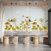 Yellow Flower with Birds wallpaper mural as a feature wall in a home office workspace in yellow tones