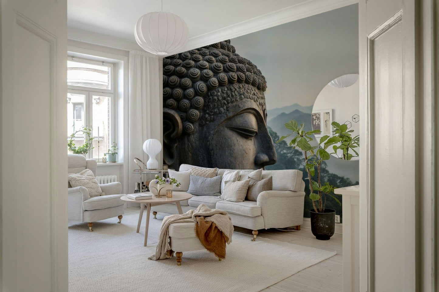 Neutral color palette wallpaper with Buddha imagery in a yoga studio setting.